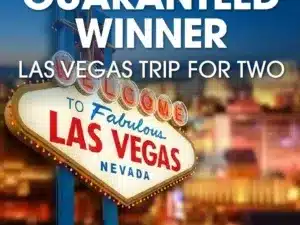 Promotional graphic for a "Guaranteed Winner Las Vegas Trip for Two" featuring the iconic "Welcome to Fabulous Las Vegas" neon sign.